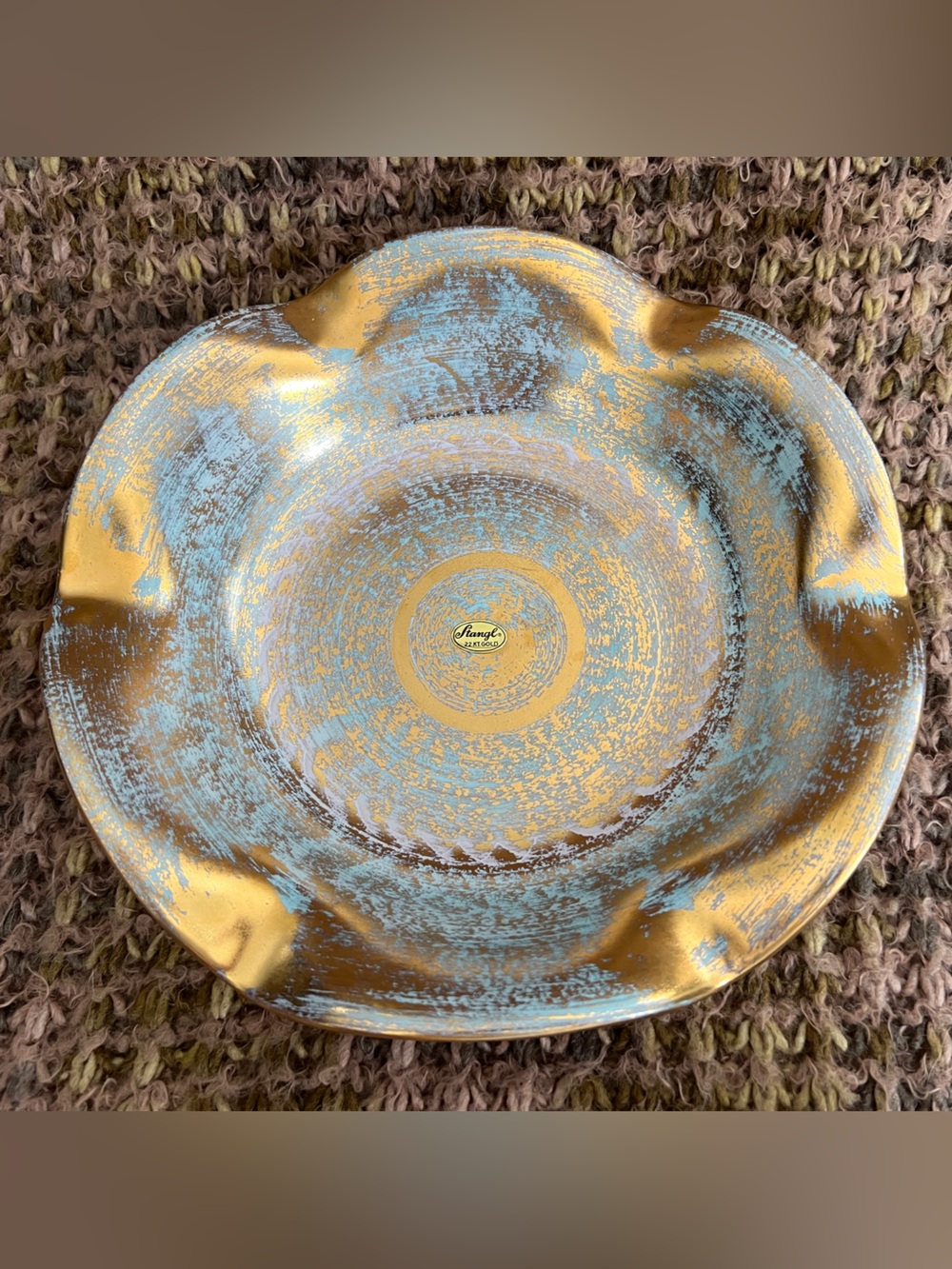 Vintage Stangl pottery bowl, specifically featuring the "Antique Gold" Blue